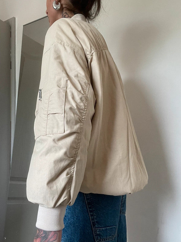Cream bomber jacket